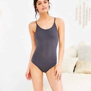 Our from under rubber body suit